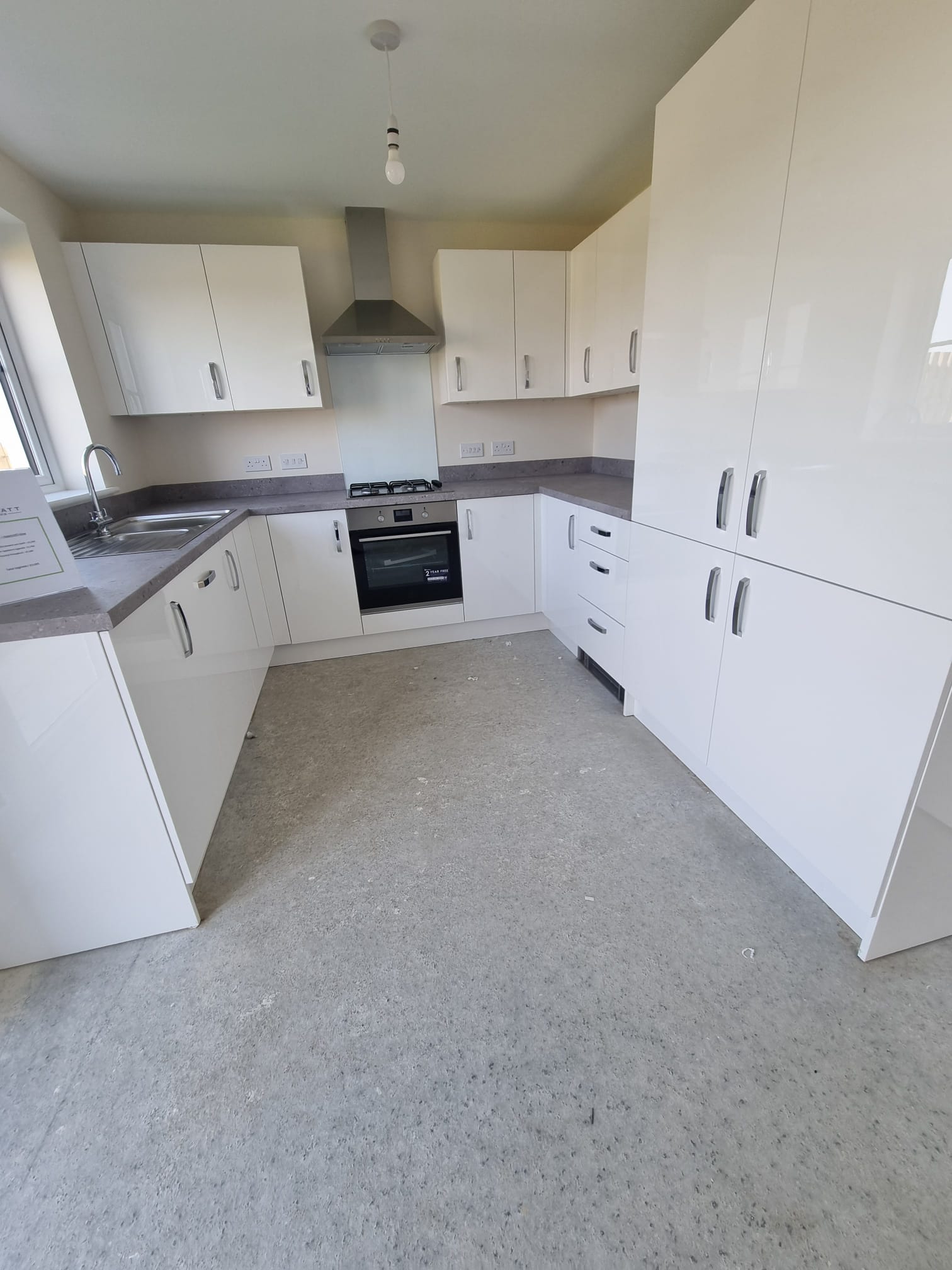A modern kitchen bathed in soft light