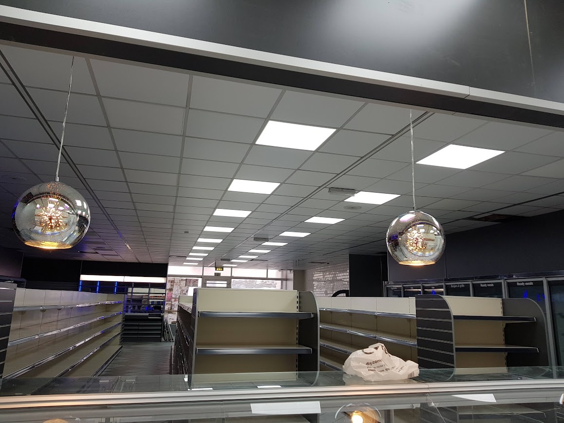 A modern store interior bathed in soft light